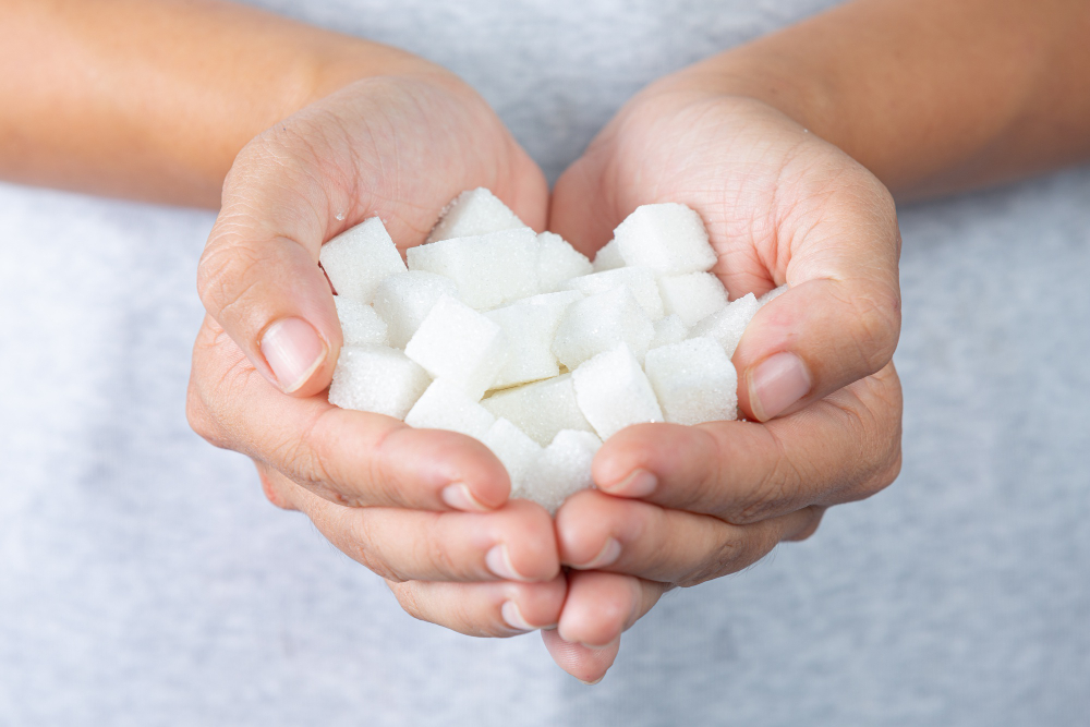 World Diabetes Day Hand Holding Sugar Cubes