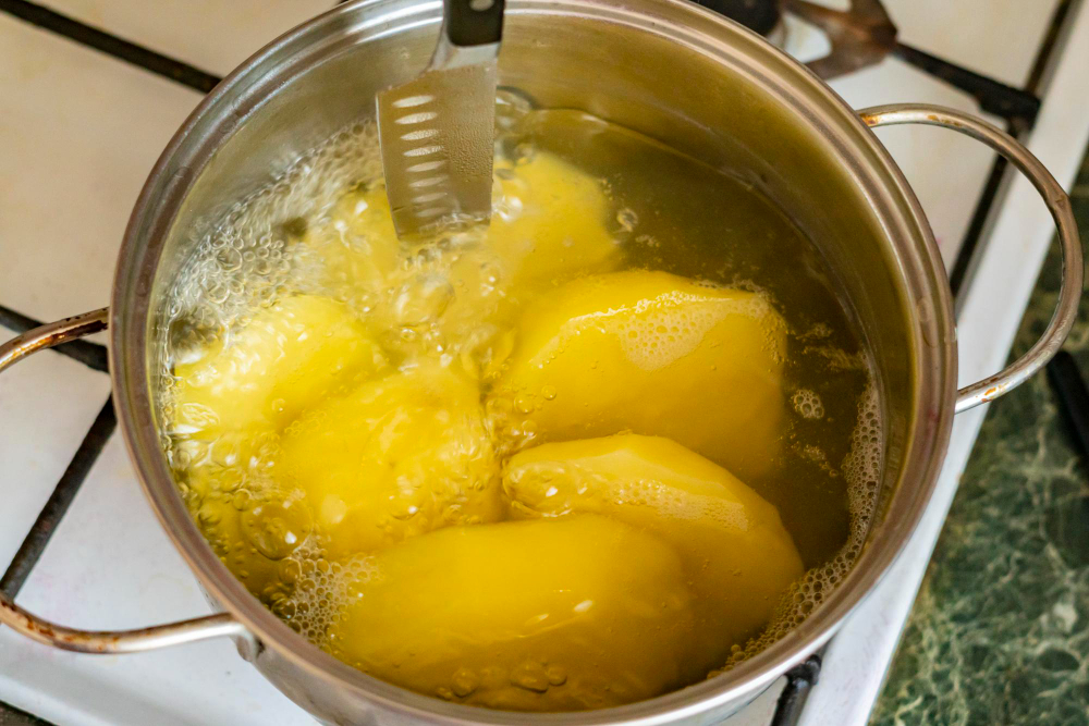 pan-with-boiling-potato-kitchen-b