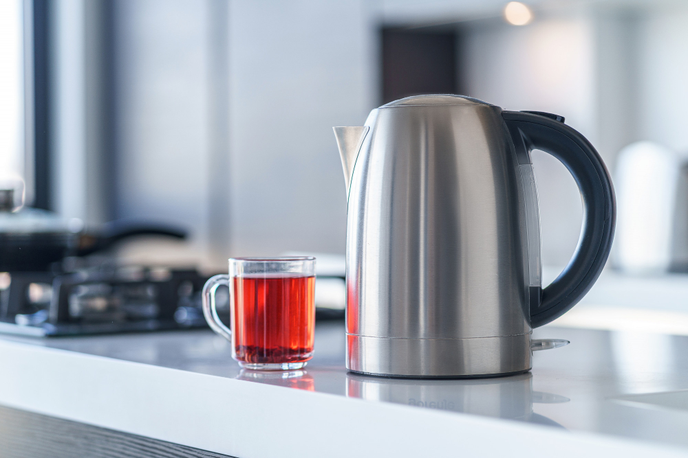 electric-kettle-boiling-water-making-tea-table-kitchen-interior-household-kitchen-appliances-makes-hot-drinks