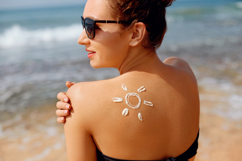 Portrait Gorgeous Woman Bikini With Drawn Sun Shoulder Beach
