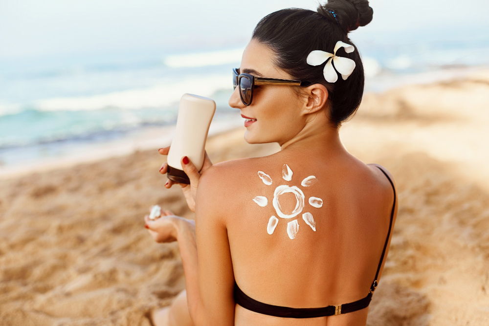 Sun Shape Created From Sunscreen Lotion Young Woman S Back