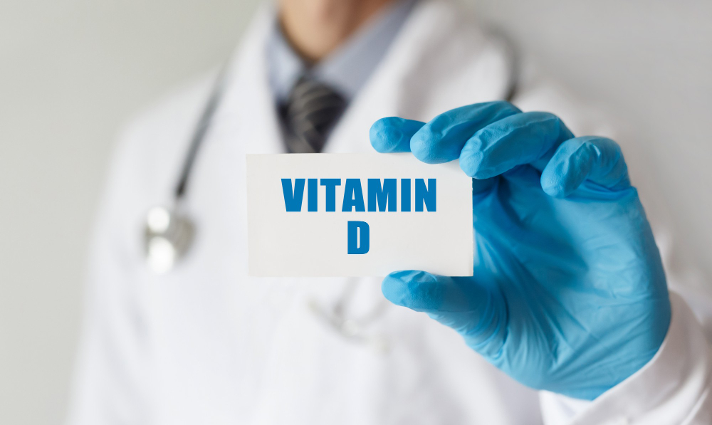Doctor Holding Card With Text Vitamin D Medical Concept