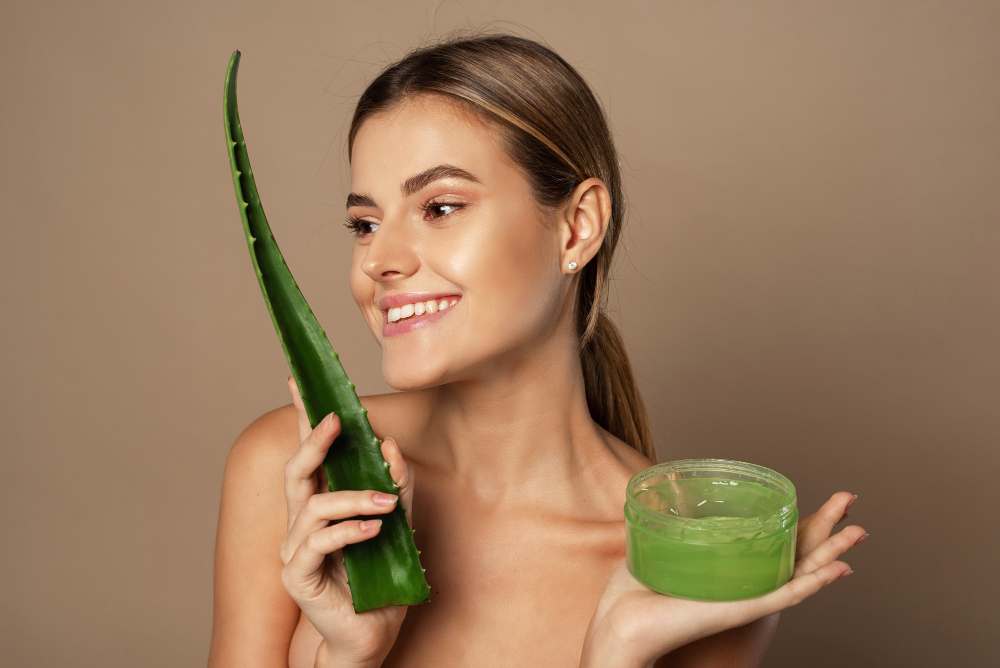 Smiling Happy Young Female Model Holding Aloe Leaf Jar Aloe Gel Beige Background Concept Skin Care Moisturizing With Natural Cosmetics