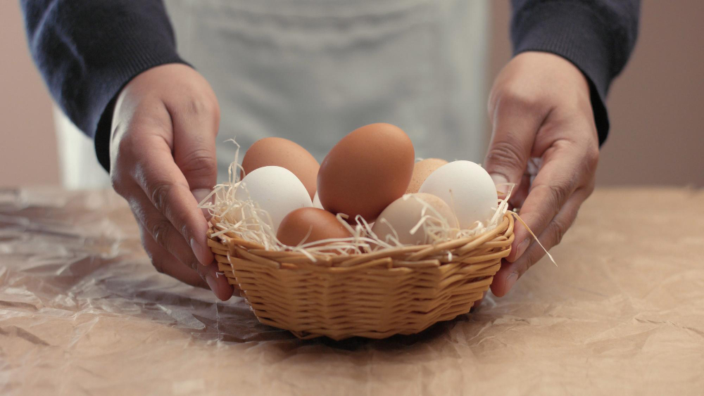 Man Takes Eggs From Basket Put It Baxoes Small Farmm Worker