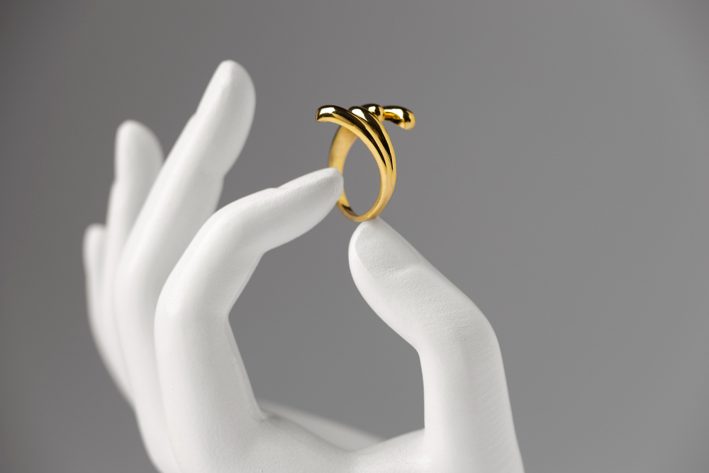 Expensive Golden Ring With Human Hand Stand Display