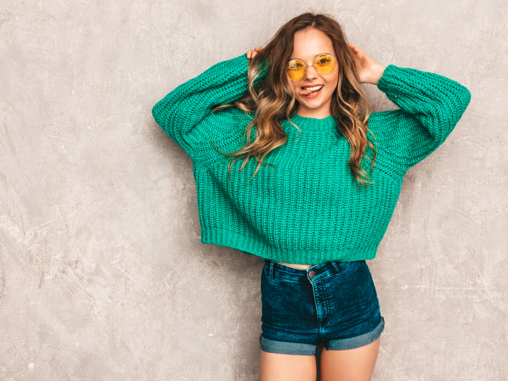 beautiful-sexy-smiling-gorgeous-girl-green-trendy-sweater-woman-posing-round-sunglasses-model-having-fun-showing-her-tongue