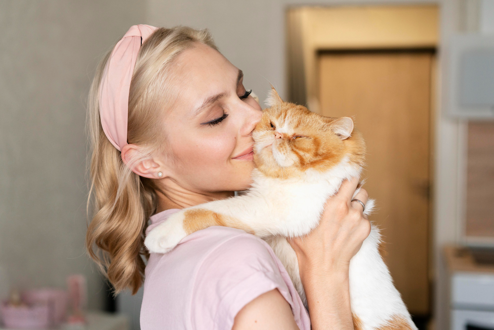 close-up-young-woman-holding-cat