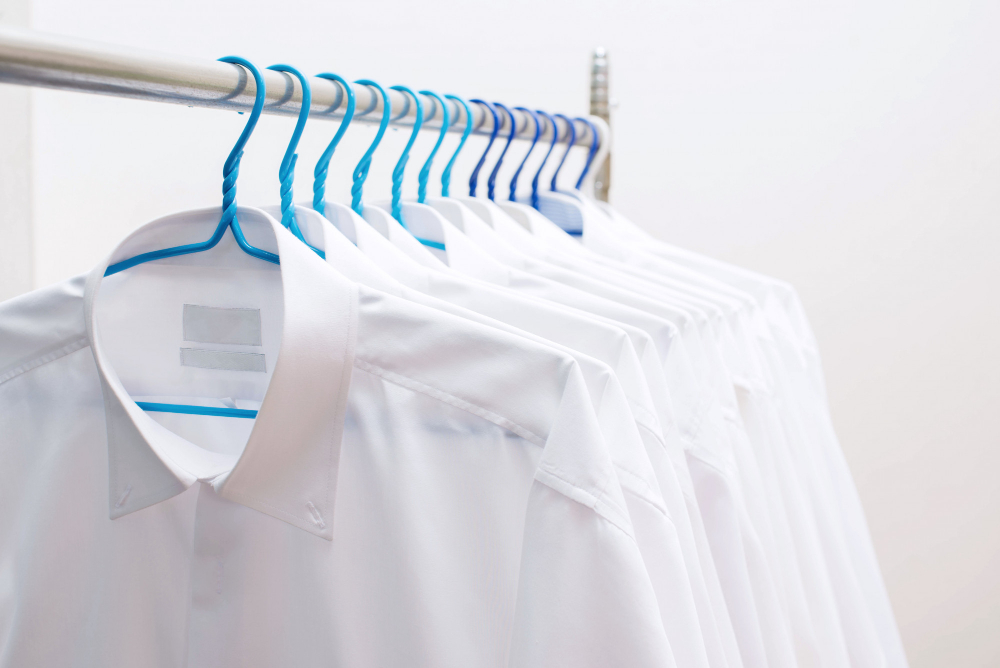 white-shirts-hanging-rack-row