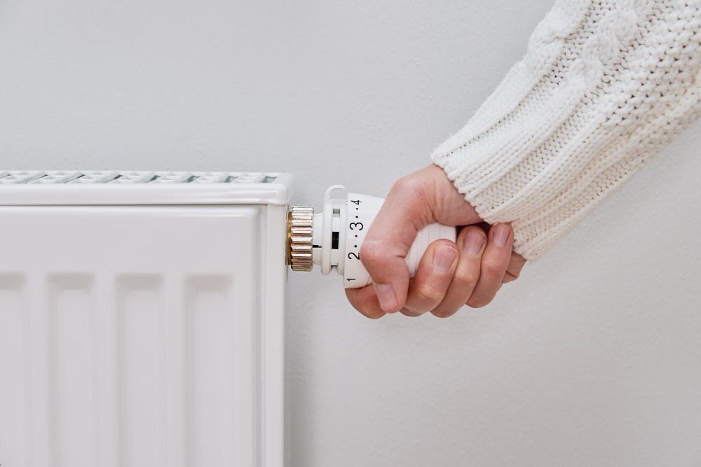 Woman Warm Sweater Adjusting Temperature Heating Radiator