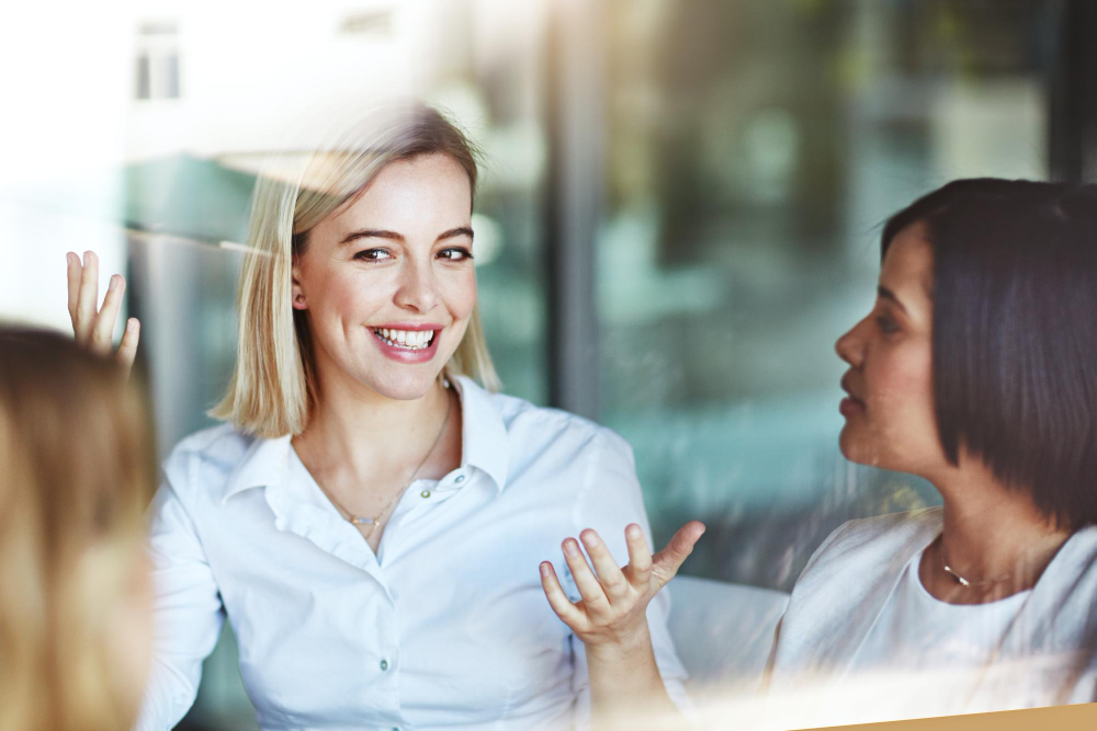 Female Office Worker Break With Colleagues Talking Having Conversation Work Business People Spending Time Together Inside Smiling Corporate Business Woman With Team Indoors