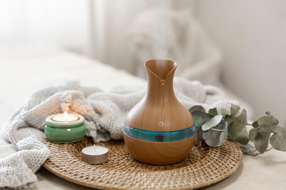Spa Composition With Aroma Oil Diffuser Lamp Blurred Background