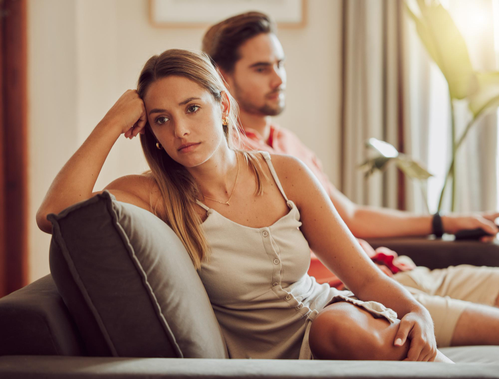 Unhappy Sad Annoyed Couple After Fight Are Angry Each Other While Sitting Couch Home Woman Is Stressed Upset Frustrated By Her Boyfriend After Argument