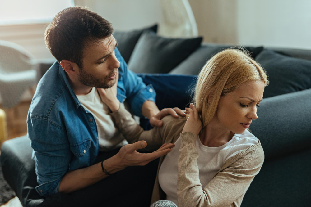 Displeased Woman Refusing Talking With Her Boyfriend While Having Argument Home