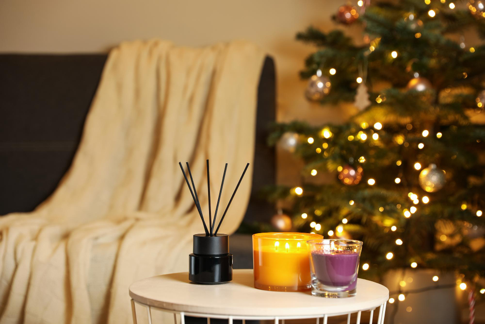 Beautiful Candles Reed Air Freshener Near Christmas Tree Indoors Cosy Atmosphere