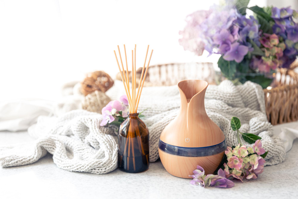 Aroma Oil Diffuser Lamp Flowers Knitted Element Blurred Background