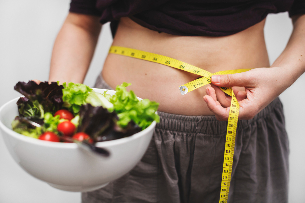 Woman Measuring Her Tummy Weight