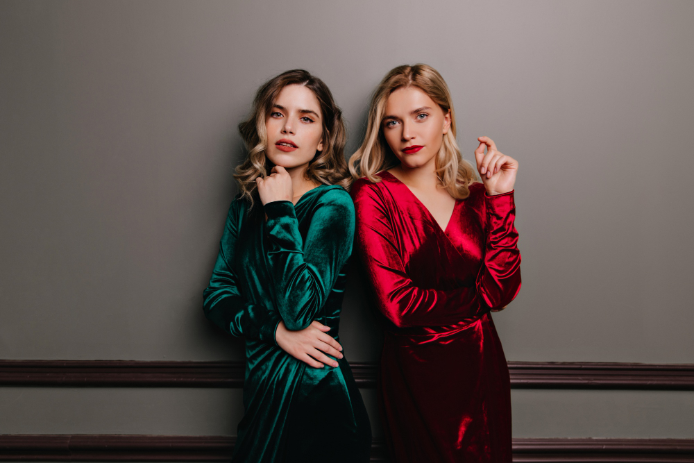 Curly Caucasian Model Green Dress Indoor Portrait Two Adult Sisters Velvet Outfits