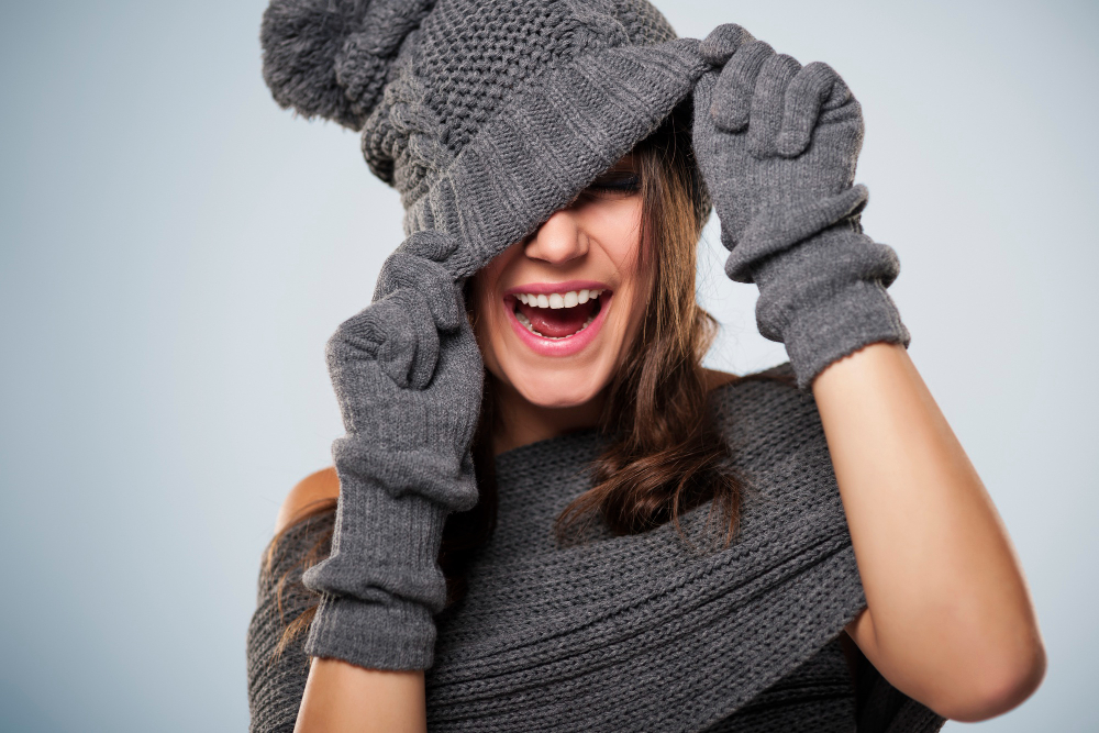 Young Woman Have Fun With Winter Clothing