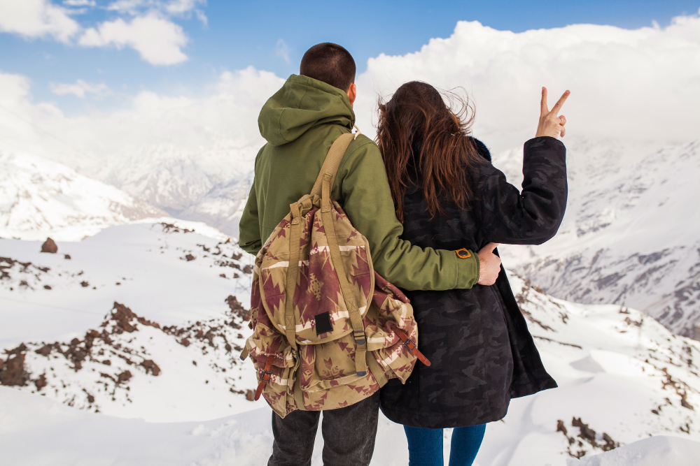Young Beautiful Hipster Couple Hiking Mountains Winter Vacation Traveling Man Woman Love View From Back