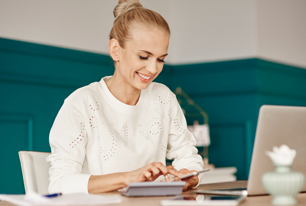 Cheerful Woman Budgeting Home