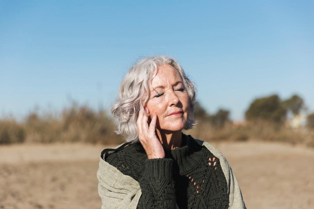 Beautiful Senior Woman Relaxing Outdoors