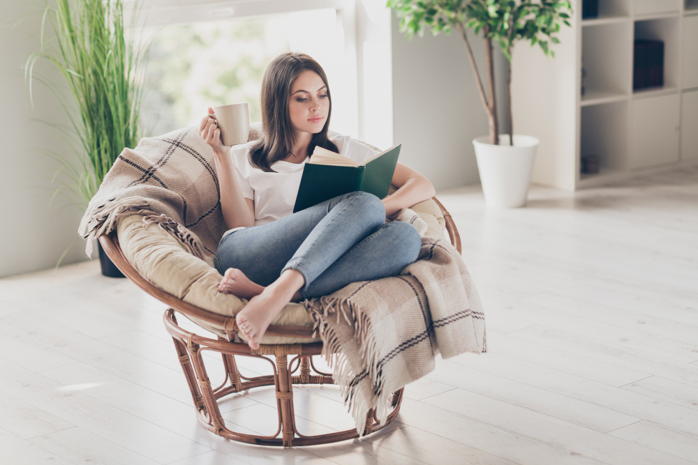 Full Size Photo Concentrated Girl Read Book Sitting Wicker Chair With Coffee Cup Wear White T Shirt House Indoors