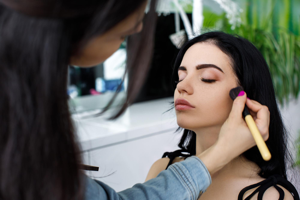 Make Up Artist Doing Professional Make Up Young Woman Model
