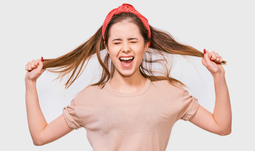 Angry Young Woman Trying Comb Unruly Damaged Hair Screaming From Pain Discomfort Posing White Background Pretty Female Dressed Beige Tshirt Red Head Band Suffering From Unhealthy Hair