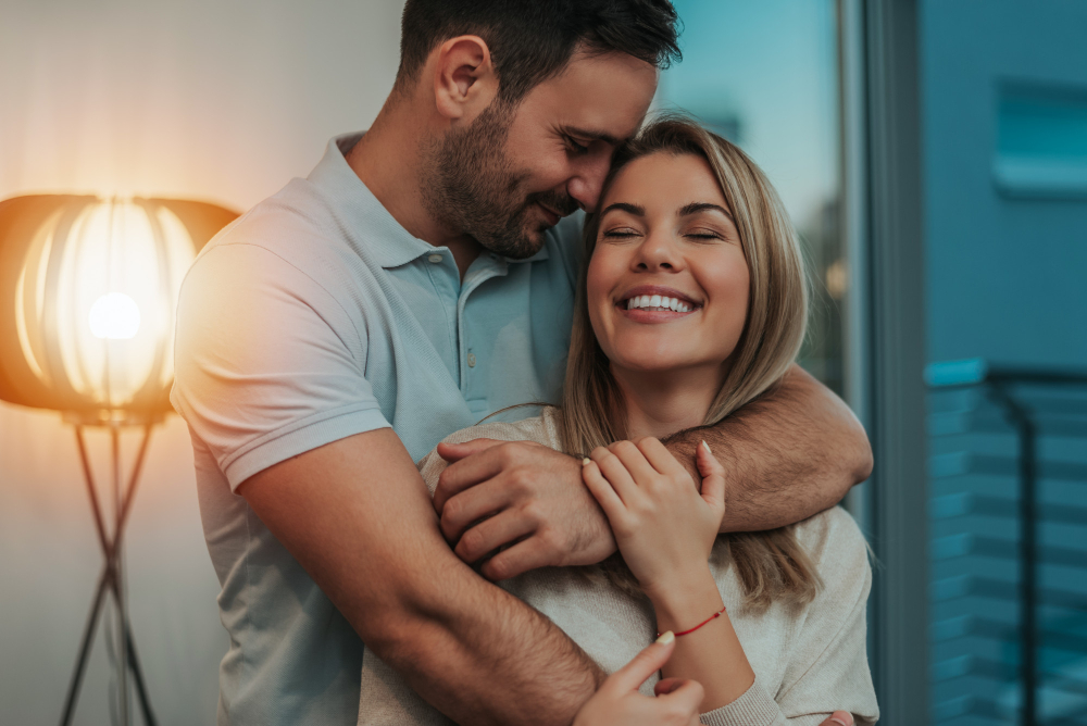 Cute Couple Hugging Smiling Their New Home