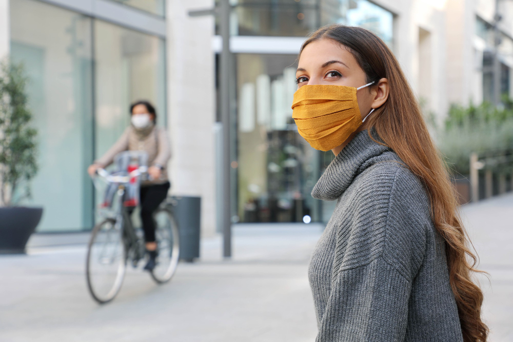 Woman With Protective Mask Looks Around Sitting Bench Waiting Better Times Modern City