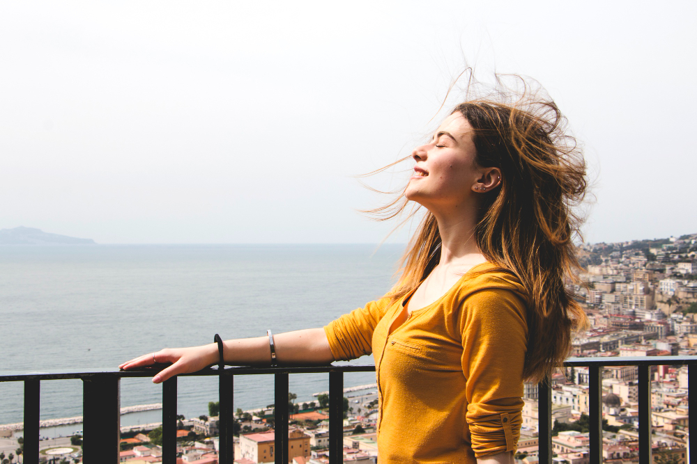 Woman Enjoying Breath Wind