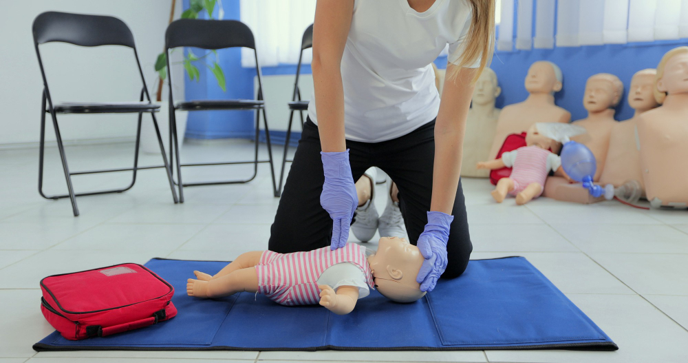 Practitioners Training Medical Learning Baby Mannequin Giving First Aid Child Dummy First Aid Training