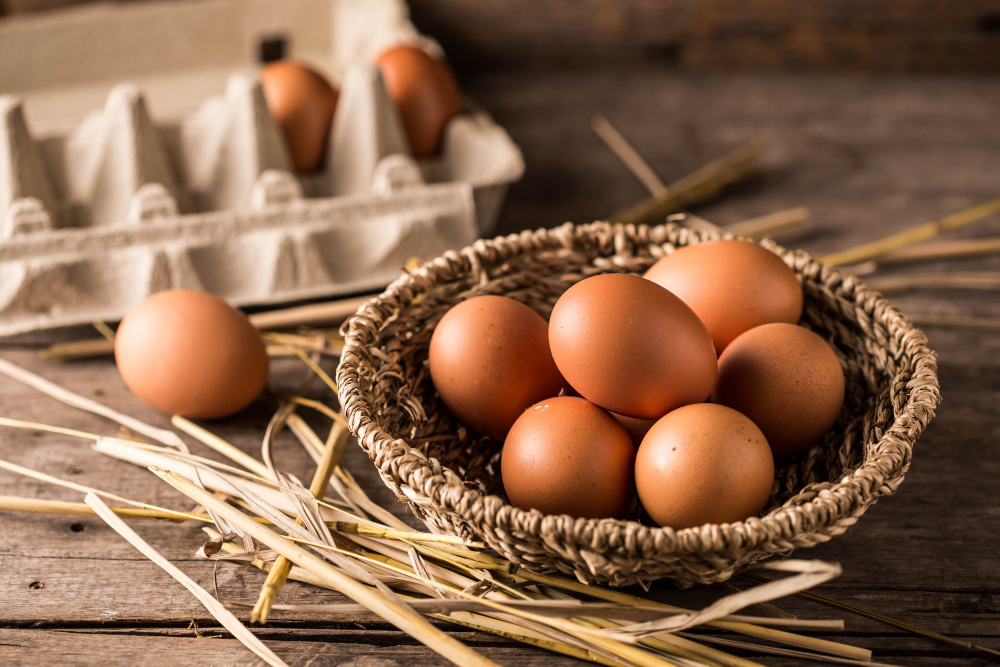 eggs-wooden-table-background